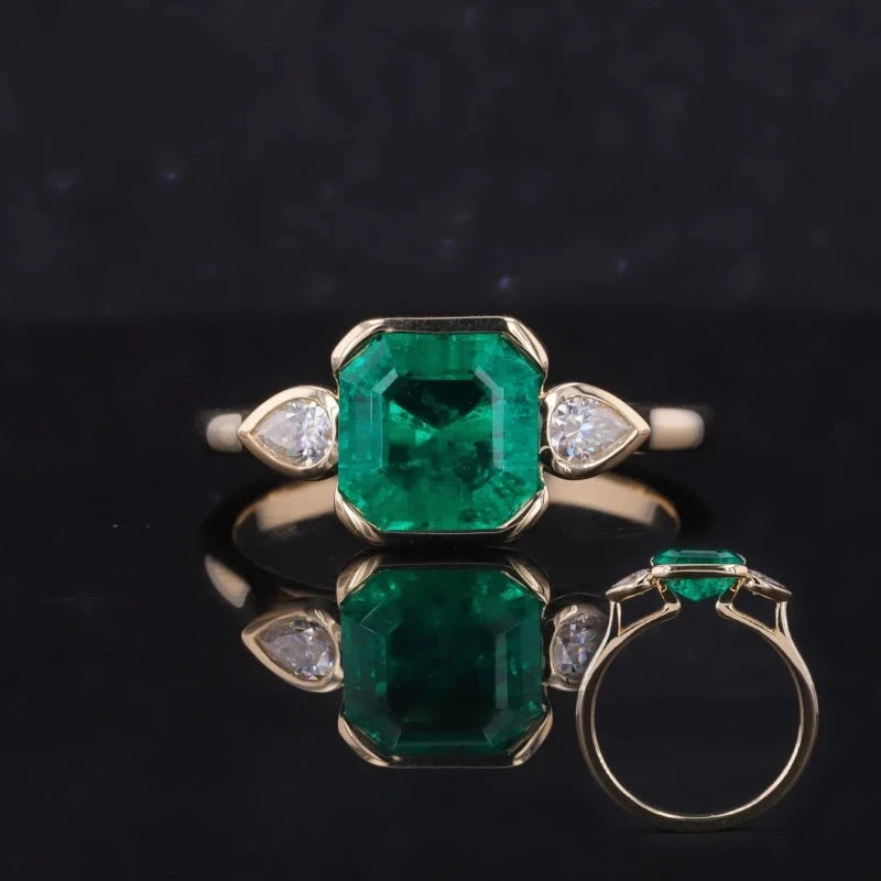 8*8mm (2.00ct) Asscher Lab-Grown Zambian Emerald with Pear Moissanites Three-Stone Ring in 10K Solid Yellow Gold