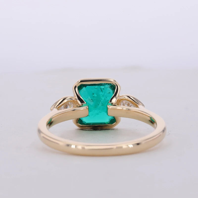 8*8mm (2.00ct) Asscher Lab-Grown Zambian Emerald with Pear Moissanites Three-Stone Ring in 10K Solid Yellow Gold